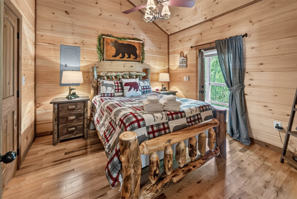 Rustic bedroom with cozy log bed and charming woodland decor.