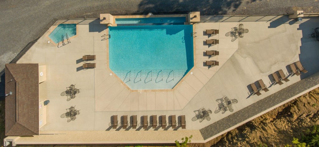 Birds eye view of the pool and hot tub area.