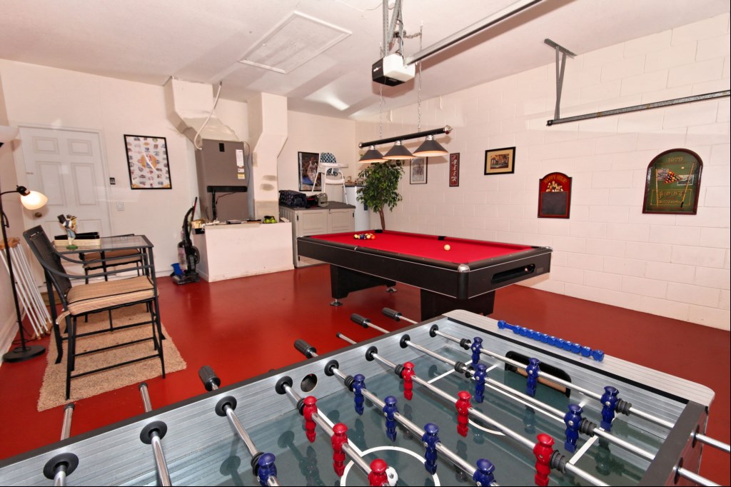 Games room with bar table and stools while you wait your turn