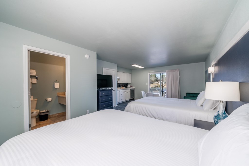 Double queen room includes a 45in flat screen tv with direct tv access and a kitchenette