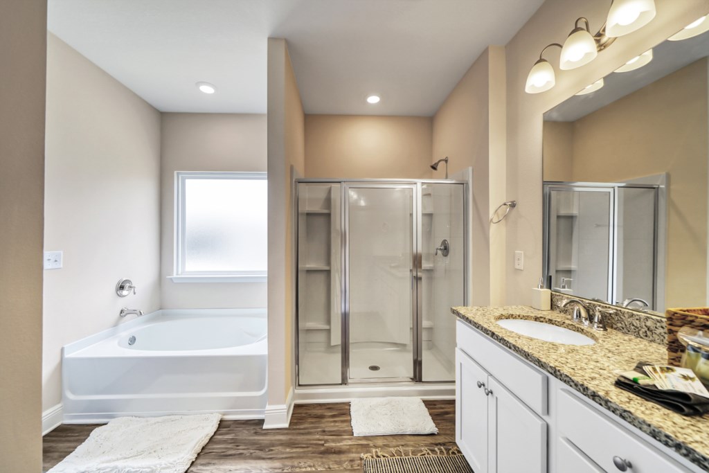 The master bath also provides double vanity and private water closet