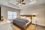 Beautiful tray ceiling decorate the master suite 