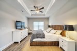 Private king master bedroom with ceiling fan and flat screen, Roku, television