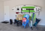 Beach amenities include yolo board, chairs, toys, and wagon