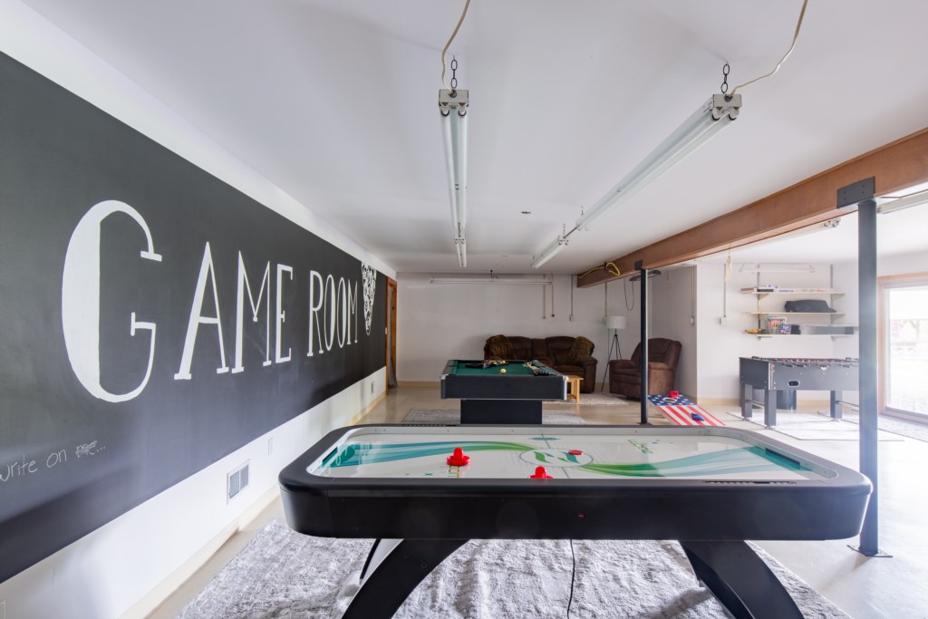 Basement Game Room! Tap into your competitive nature for a game of pool, foosball, or air hockey! 