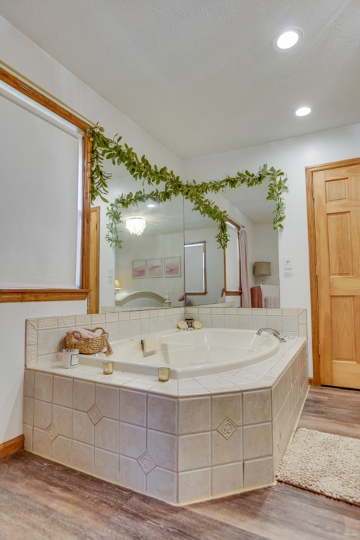 Jacuzzi in master bathroom to relax and refresh!