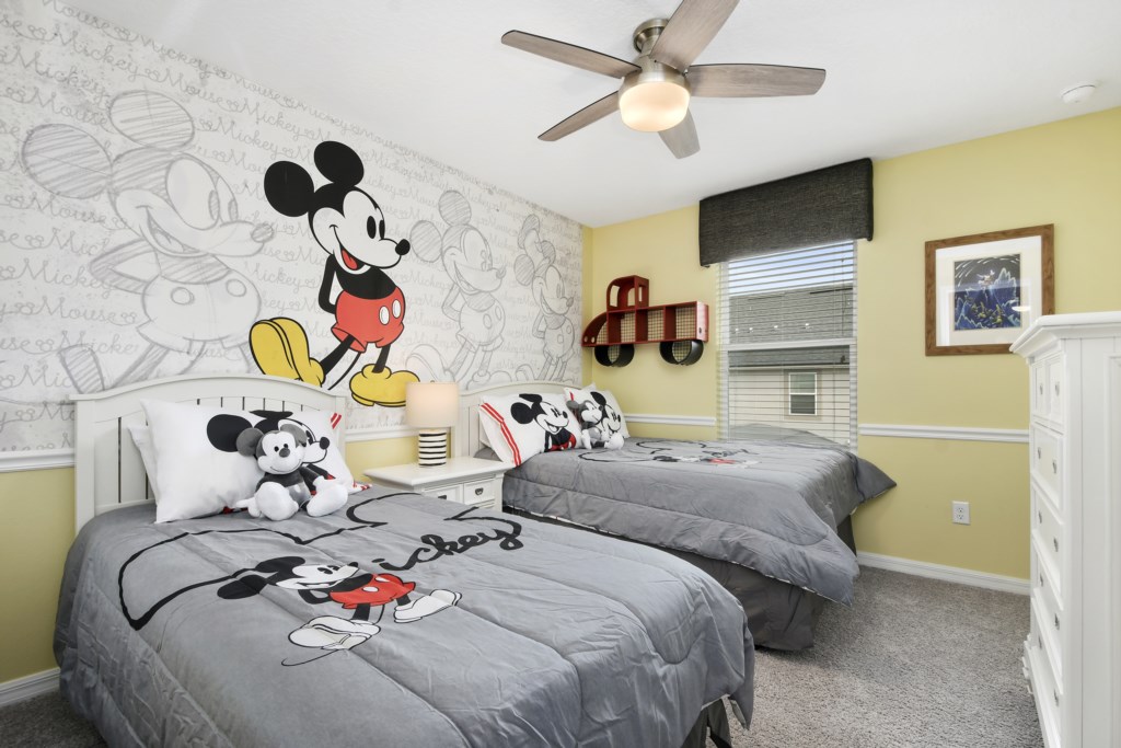 Mickey Themed Bedroom with ceiling fan