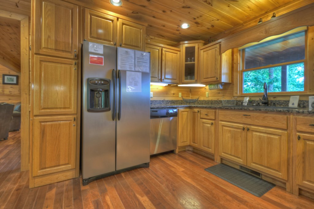Large fully stocked kitchen perfect for preparing home cooked meals 
