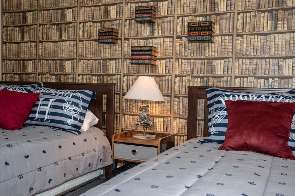 Harry Potter themed bedroom with a full + twin beds.