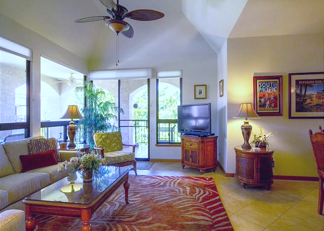 Lounge in paradise with vaulted ceilings, rich island décor, and views that invite you to stay awhile.