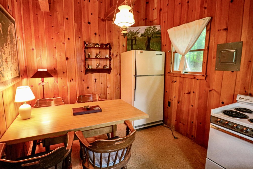 Guest cottage dining space and refrigerator
