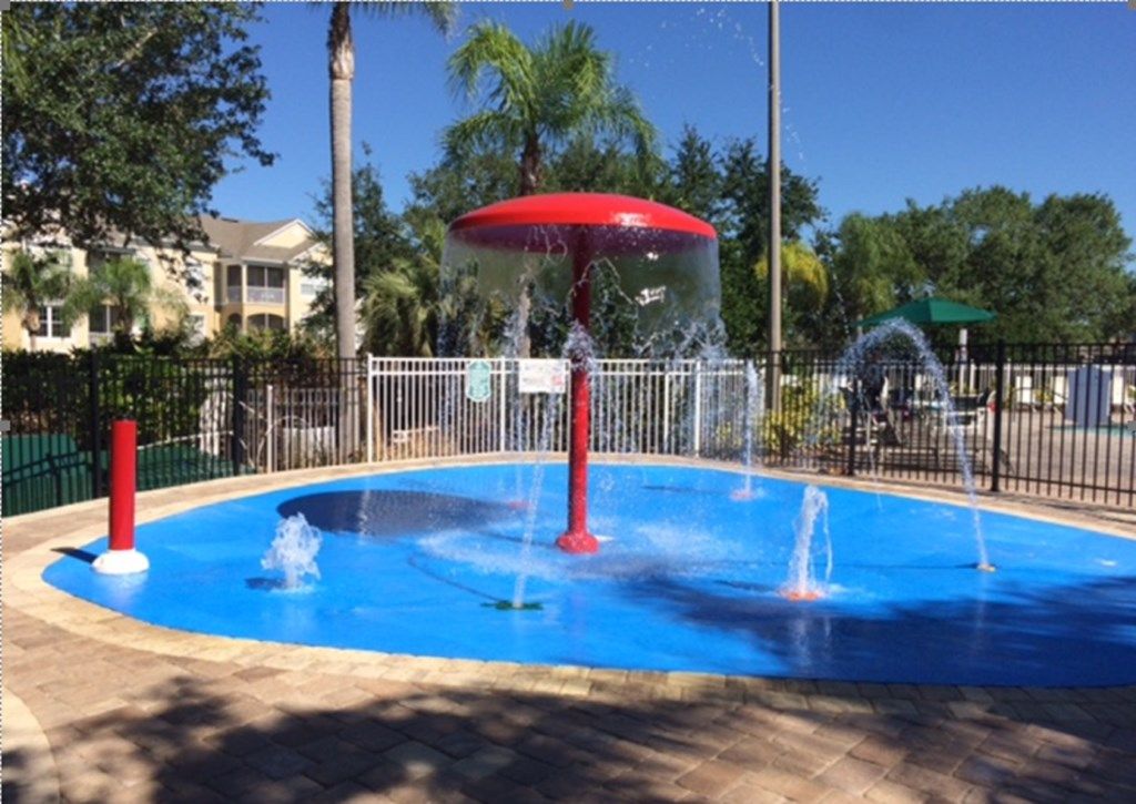 Let your children enjoy the splash pad at the Resort.