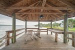Enjoy morning coffee or catch your dinner off the shared dock 