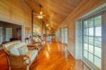 This large living area is adjacent to the screened in porch overlooking Indian Pass Lagoon 