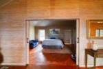 King bedroom with pocket doors for privacy