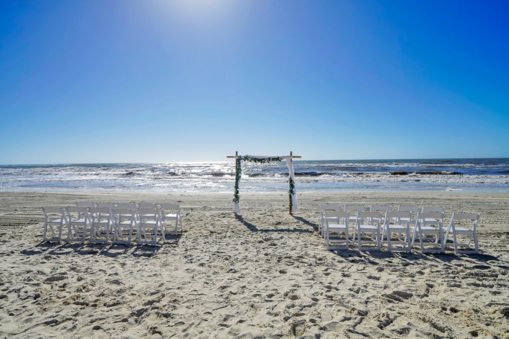 Private beach access provides a romantic, secluded location for wedding; Beach setup provided by Design by Doran