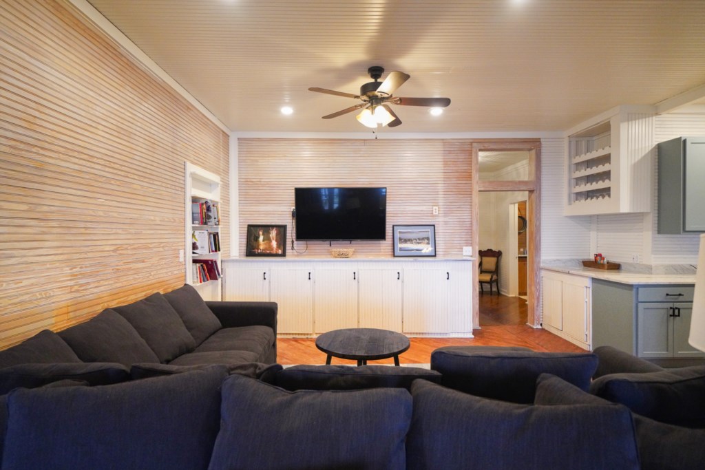 The Main House at The Grove; comfortable sectional with flat screen television and satellite cable 