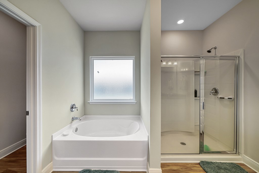Master Bathroom with soaking tub and walk-in shower 