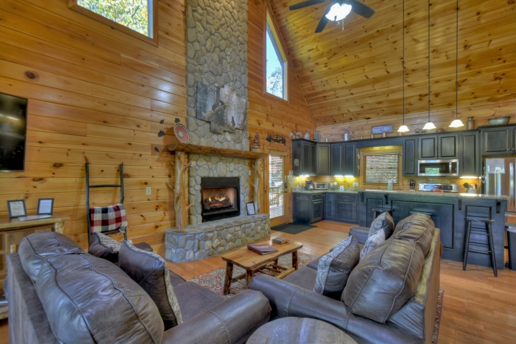 Main level living area with seasonal gas fireplace 