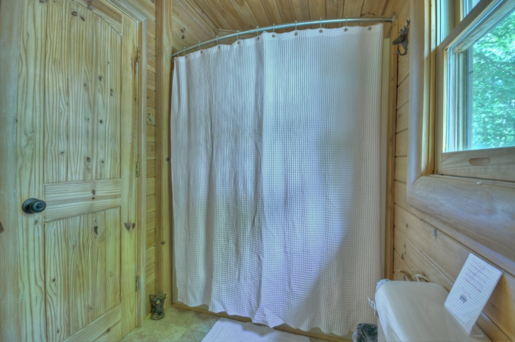 Loft bathroom with tub/shower combo