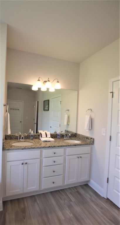 Primary bath also offer double vanity with a starter supply of amenities 