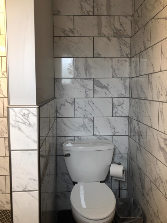Drift On Inn Private Studios showing Bathroom Toilet in Room