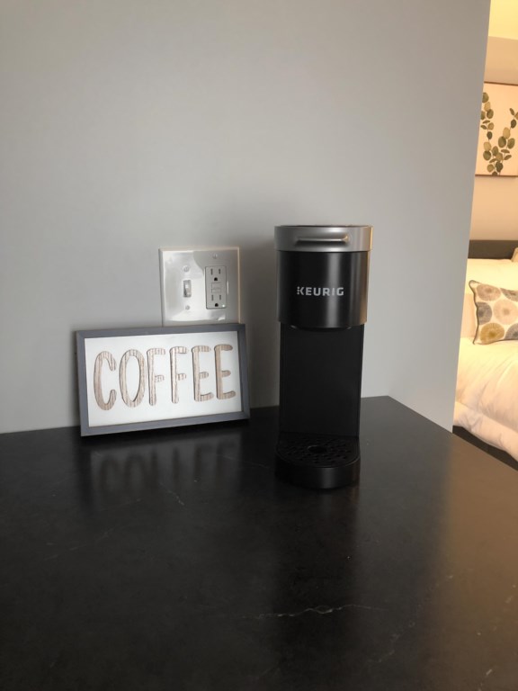Drift On Inn Private Studio with Keurig Coffee maker and coffee, sugar and cream