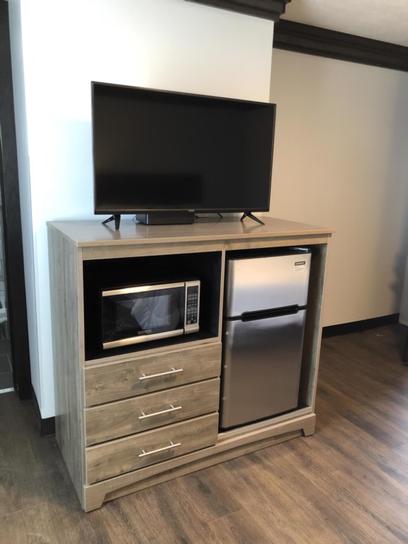Drift On Inn TV, mini fridge with freezer and microwave
