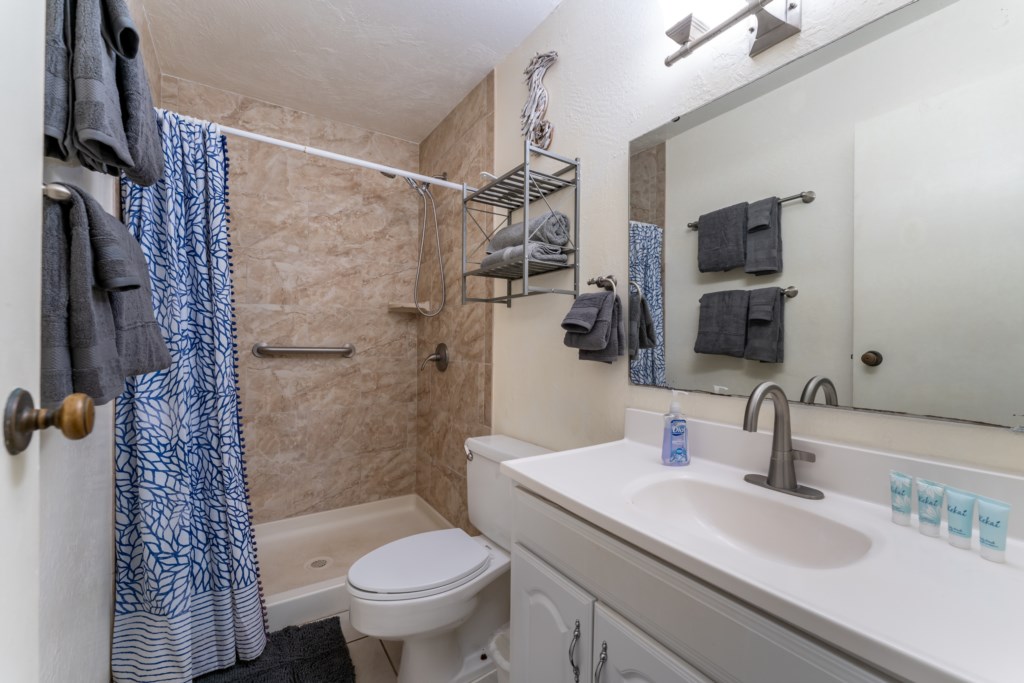 Renovated bathroom - shower with towels and beach towels provided