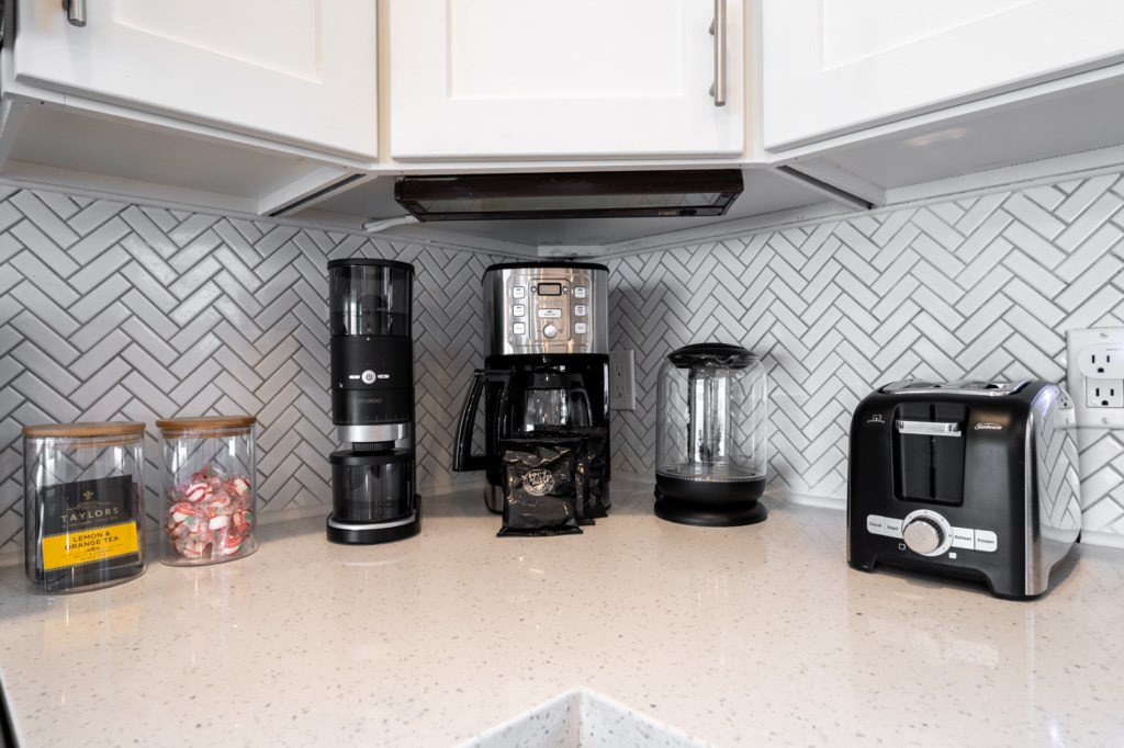 This home includes a variety of modern appliances, and coffee and tea. 