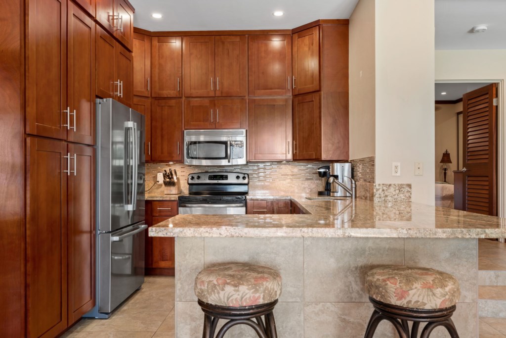 Kitchen with fridge, stove, microwave, dishwasher and equipped to make your gourmet meals