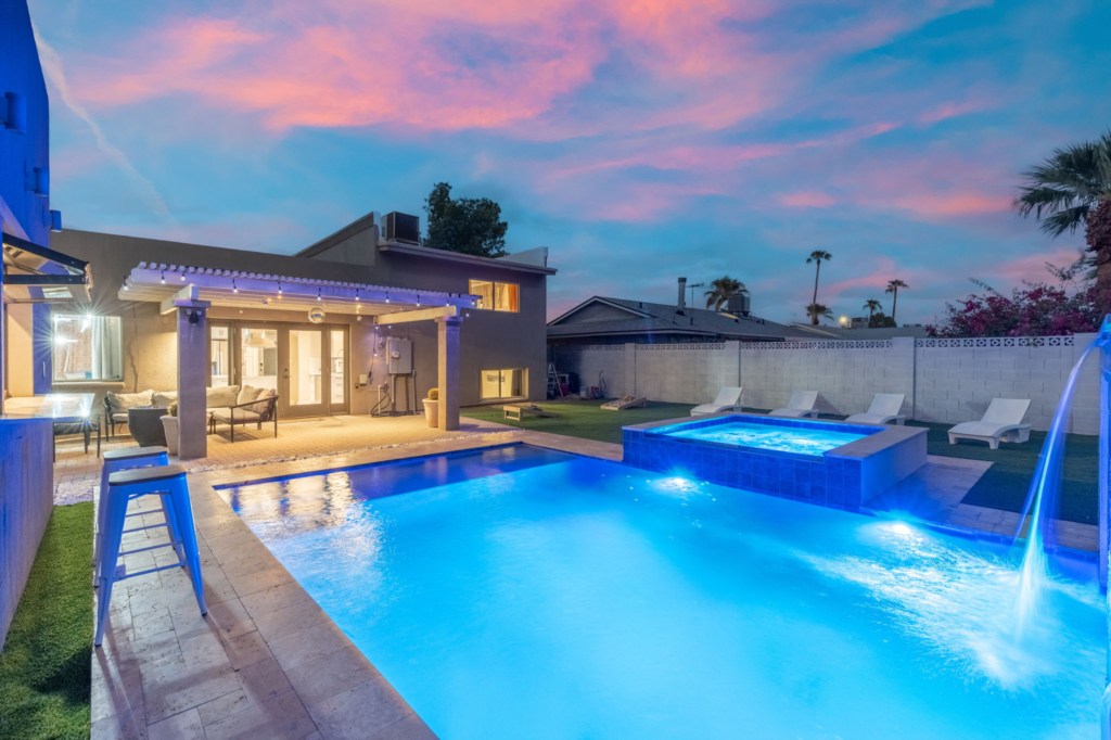 Relax by the private pool with spa, perfect for sunset swims and evening gatherings.