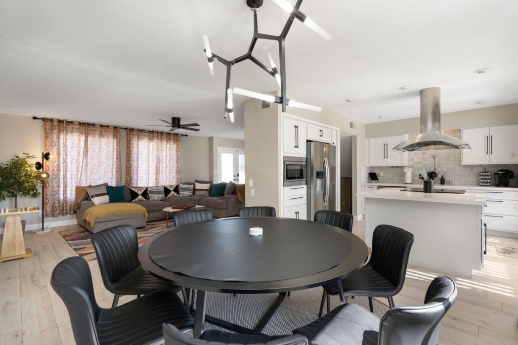 Open-concept living area with modern kitchen and spacious dining for family gatherings.