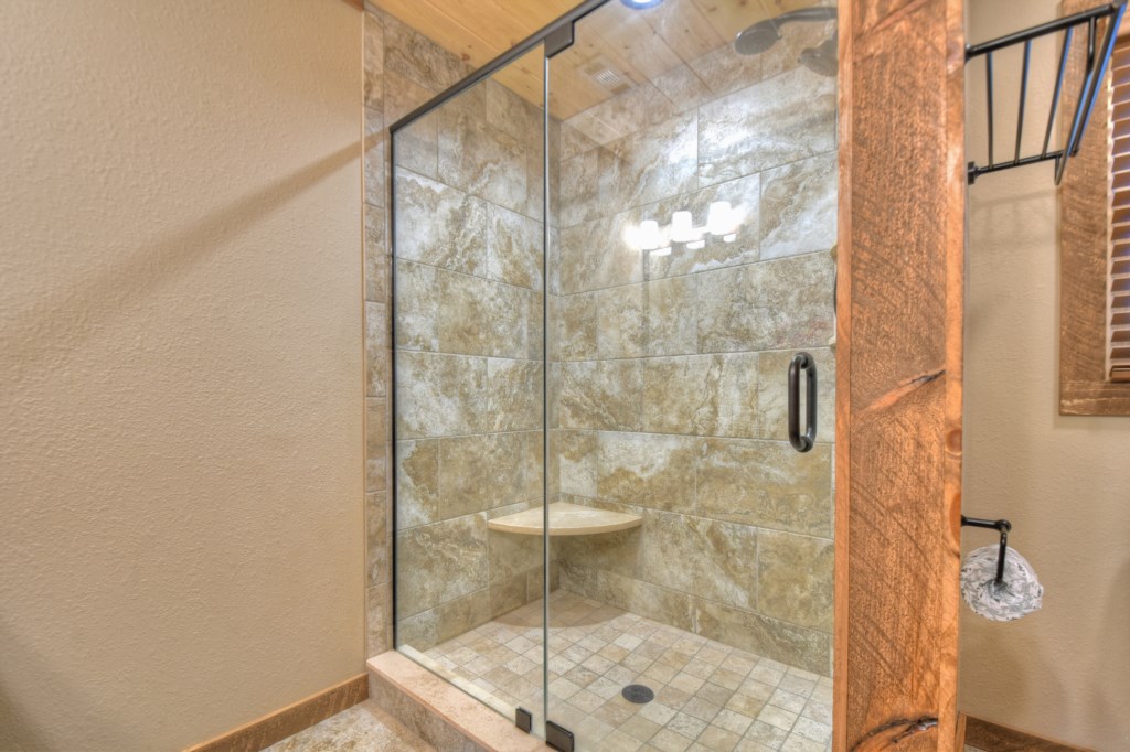 Master bathroom with a walk in shower 