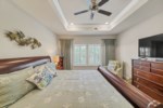 The primary bedroom provides exceptional privacy 