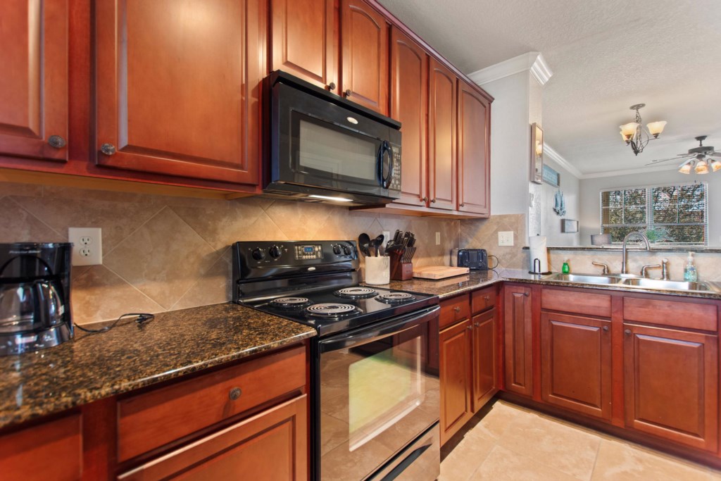 Fully-equipped kitchen with granite contertops