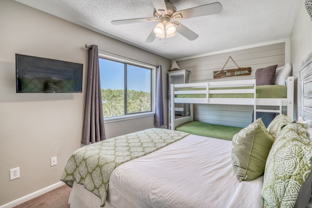 The guest room accommodates 4 with a queen bed and built in bunks with 2 twins