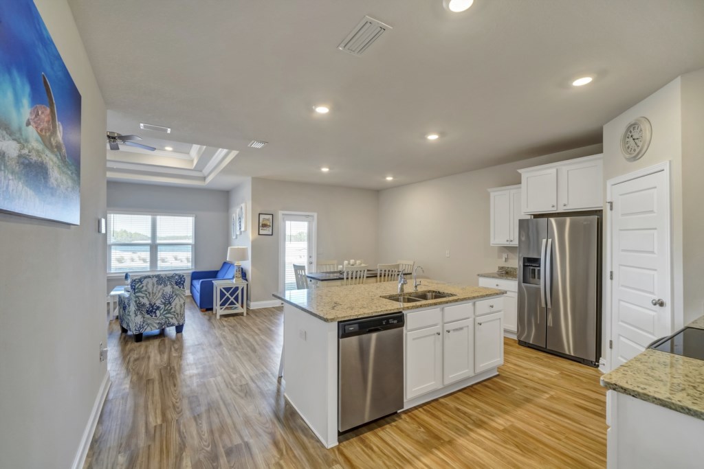 Fully stocked kitchen with all major appliances including a starter supply of amenities 