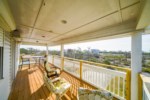 Large balconies decorate the exterior and provide ample outdoor living accommodations 