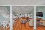 High ceilings, natural light, and beautiful hardwoods floors make for easy living 