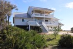 Grey Haven has resort style amenities on a large lot with supreme privacy and stunning Bay views 
