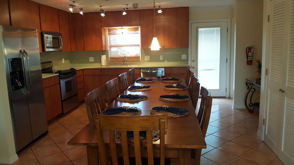 Enjoy meals together with friends and family. Dinning room seats 10 comfortably.