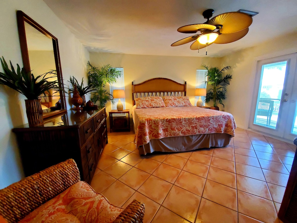 French doors in the Master will lead you to your Private Screened Lanai.