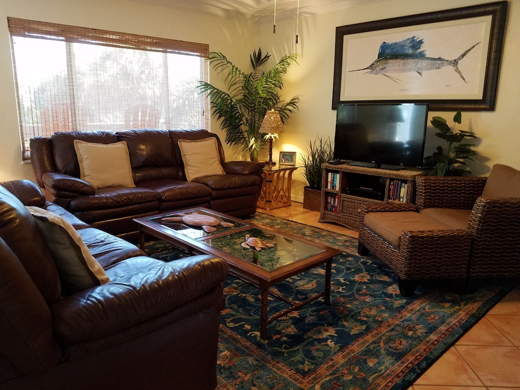Enjoy gathering in the large comfortable living room.