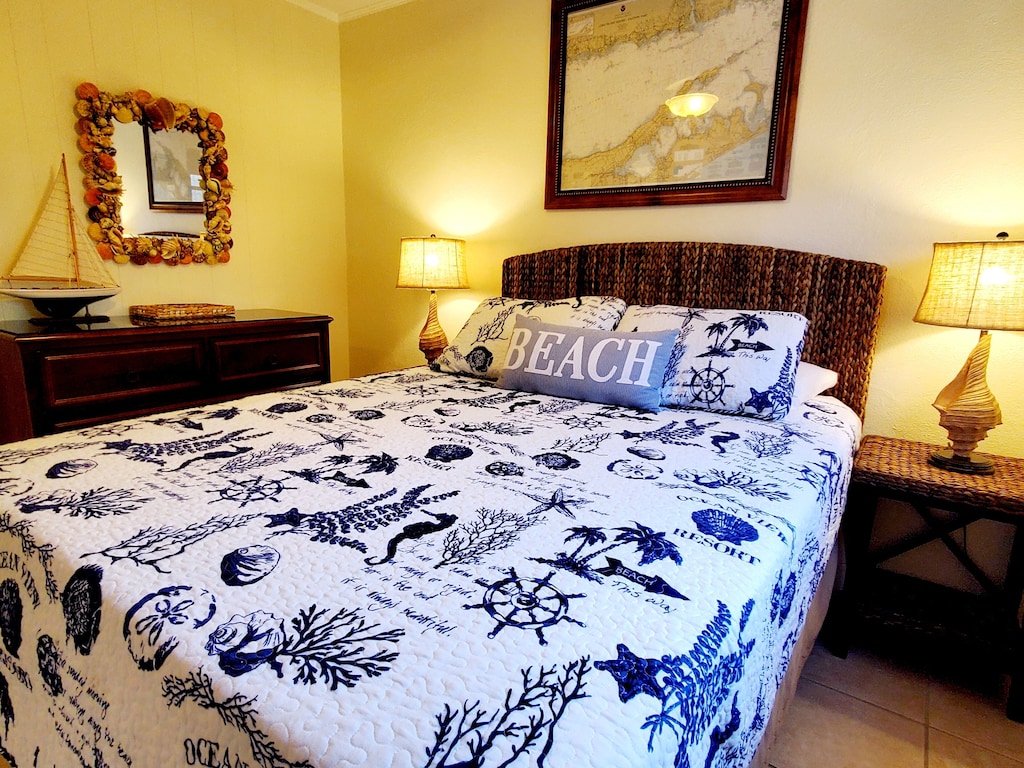 Luxury linens, new mattress, memory foam topper and TV ensure a restful sleep.