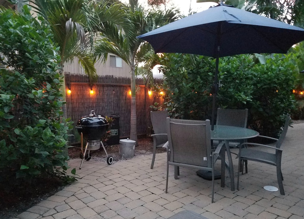 Outdoor paver patio with Weber grill
