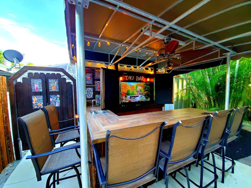 Enjoy the islands best outdoor office by day and Tiki Bar by night. 