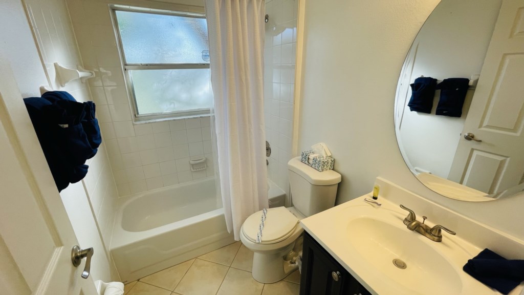 Shared Bathroom with Tub/Shower Combo