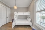 Playful bunk room with twin over full mattress 