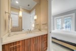 Attached bath with single vanity and walk-in shower 